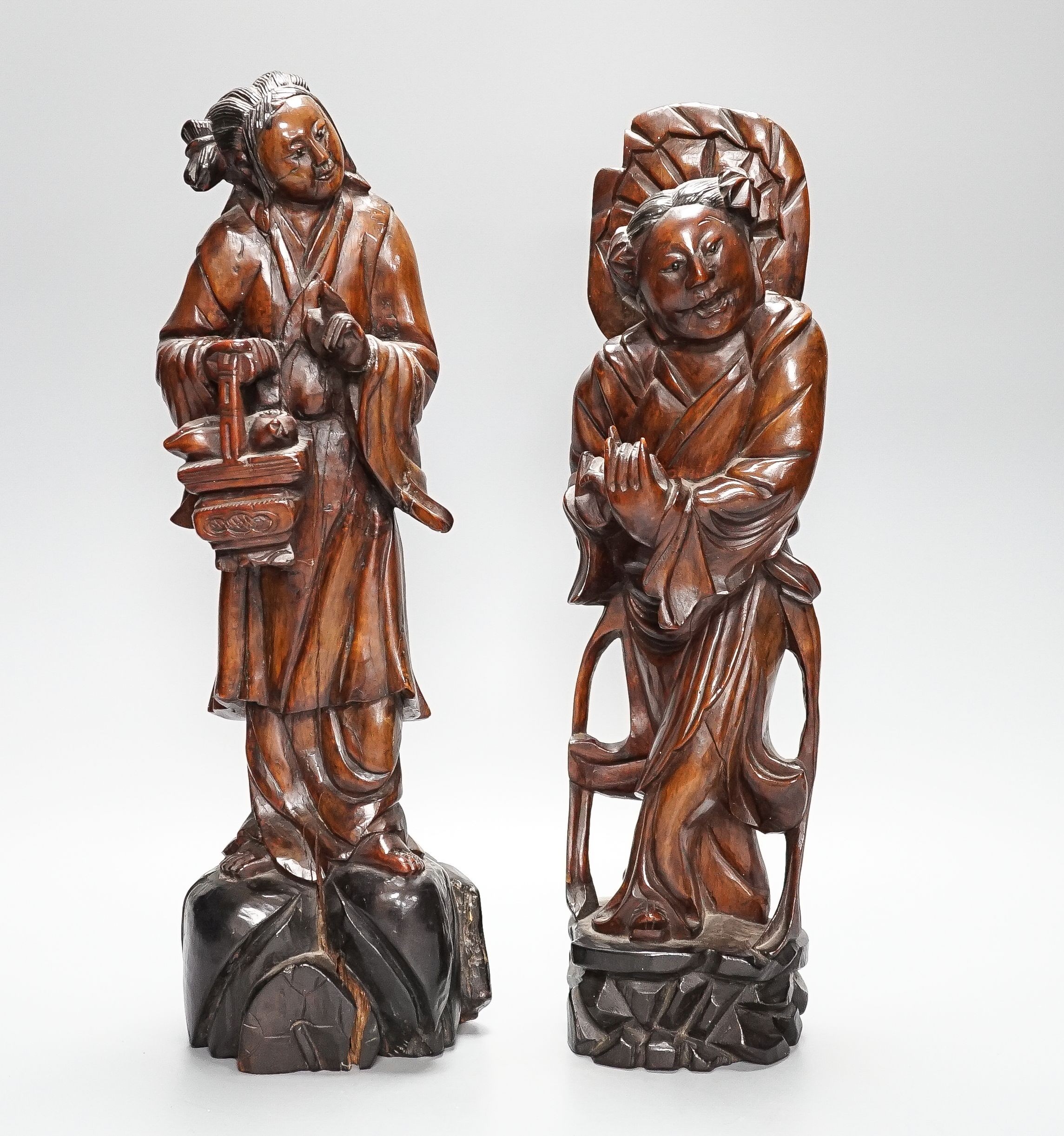 Two early 20th century Chinese carved hardwood figures of ladies 39cm